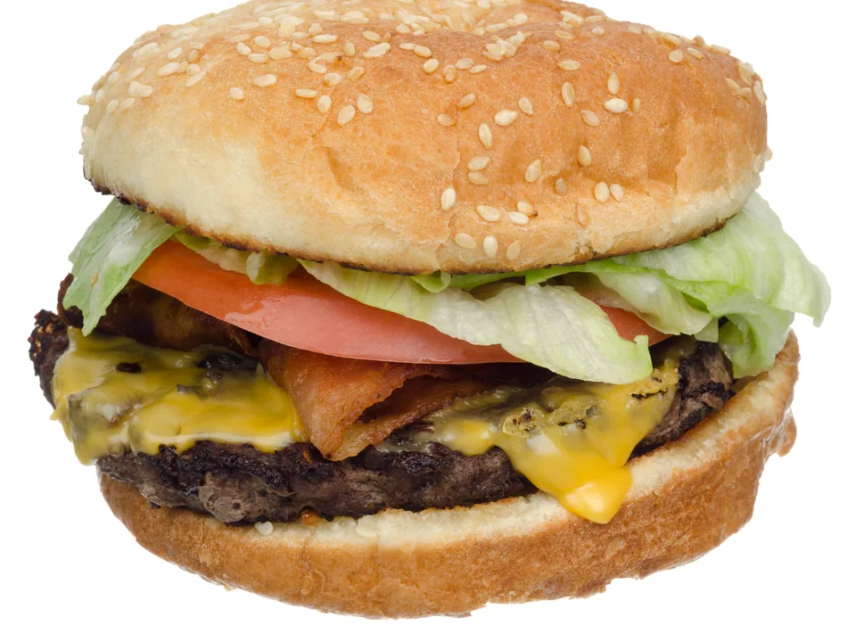 Bacon cheeseburger with lettuce and tomato